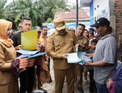 DARI KUNCI PINTU KE KUNCI DOMPET: BUPATI ASRI LUDIN BERIKAN RUMAH LAYAK HUNI + SPPT NOL RUPIAH DI KUTALIMBARU